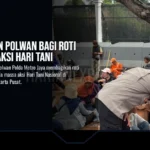 Brimob dan Polwan Bagi Roti ke Massa Aksi Hari Tani