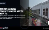Petugas Gabungan Semprotkan Water Mist di Kota Tua
