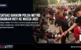 Satgas Gakkum Polda Metro Bagikan Roti ke Massa Aksi